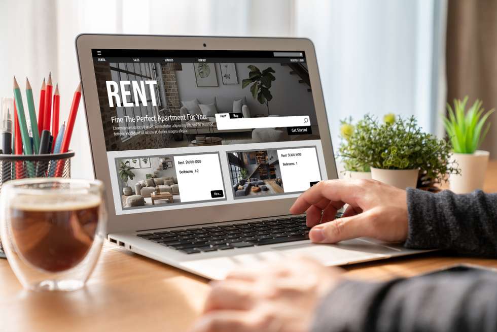 Online real estate rental search on the computer. House home or apartment rental website online.